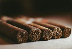 Artistic close-up of cigars showcasing detailed textures and rich colors.